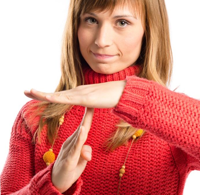 Lady with timeout hand gesture Inner Sanctuary